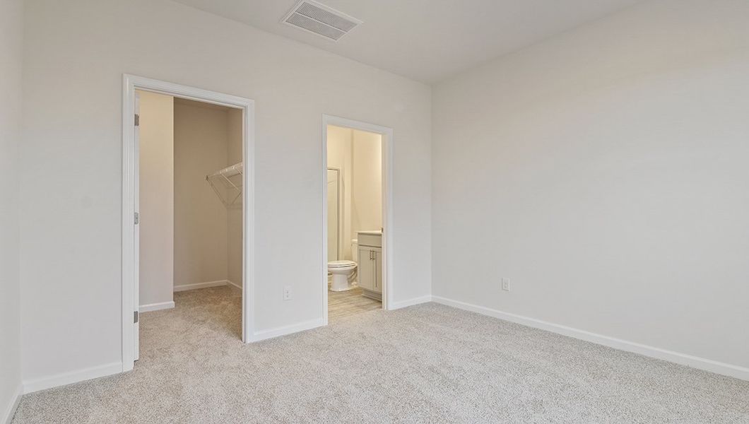 Representative unfurnished interior of a home built from the Macon by D.R. Horton in Lakestone, Woodruff (Image 16).