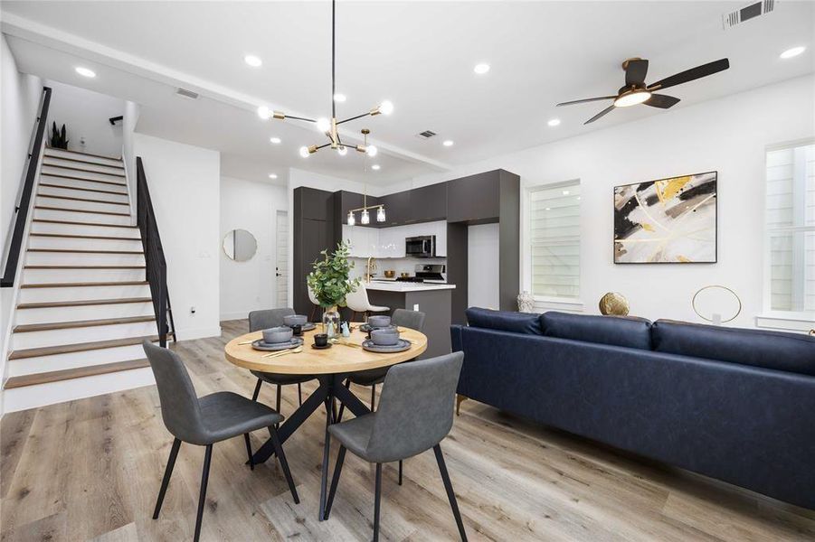 The steps lead to the second floor with two bedrooms, two full baths, and an oversized utility closet.