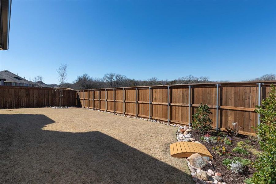 Exterior details and patio area of a home in , Denison (Image 22). Exterior details and patio area of a home in , Denison (Image 22).