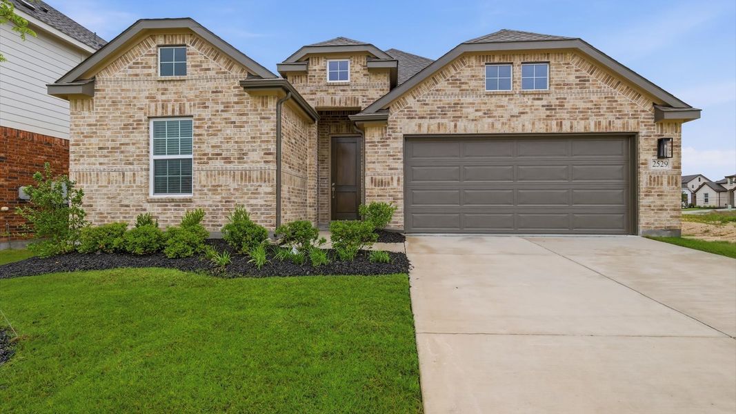 Front exterior of a new home in Churchill, Anna, TX, highlighting curb appeal (Image 21).