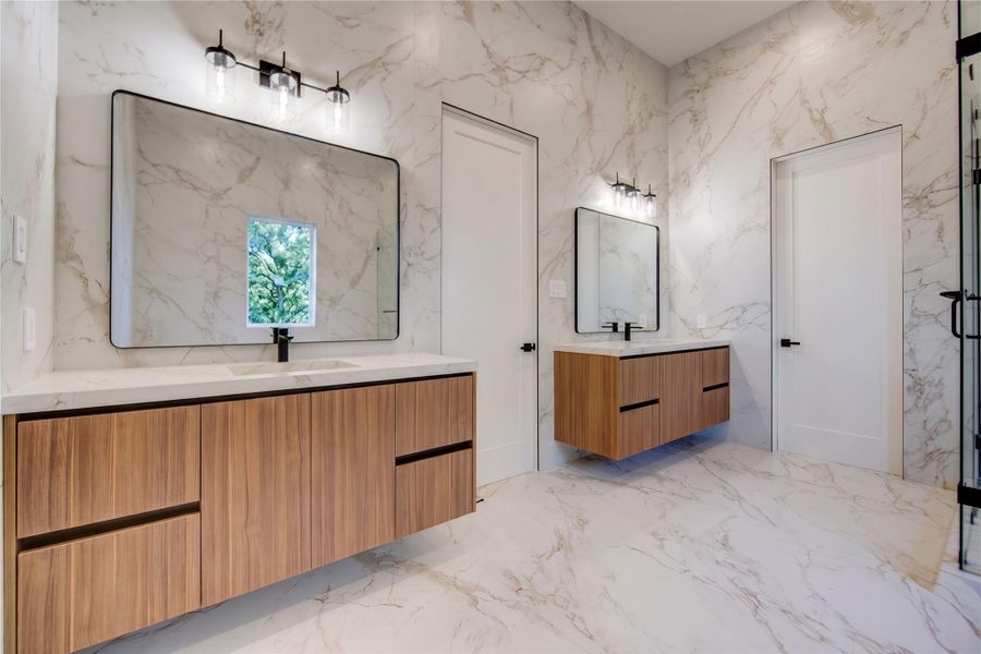 Floating double sinks in primary bath. Floating double sinks in primary bath.
