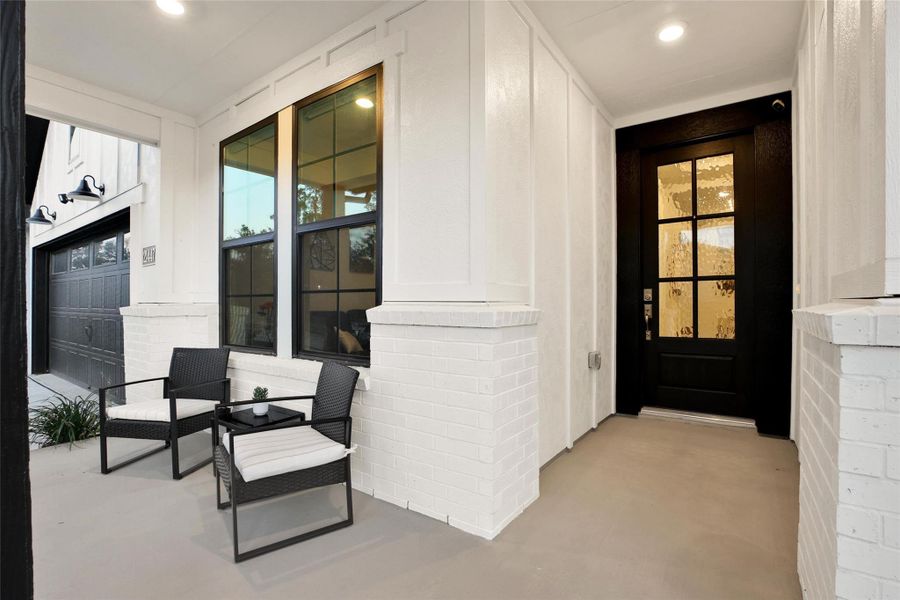 Exterior details and patio area of a home in The Highlands: Highland Duets, Porter (Image 2). Exterior details and patio area of a home in The Highlands: Highland Duets, Porter (Image 2).