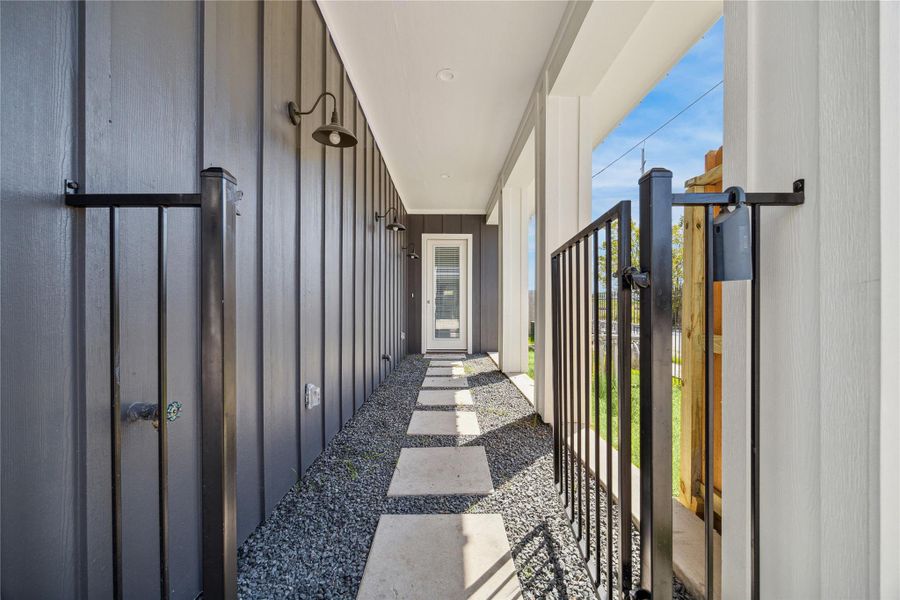 Exterior details and patio area of a home in , Houston (Image 3).