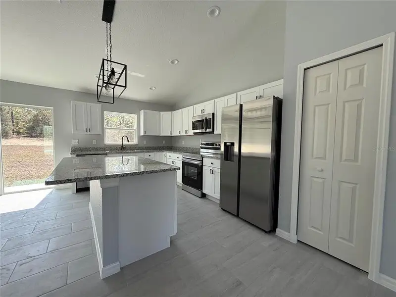 Furnished interior view inside a new home in , Dunnellon (Image 4).