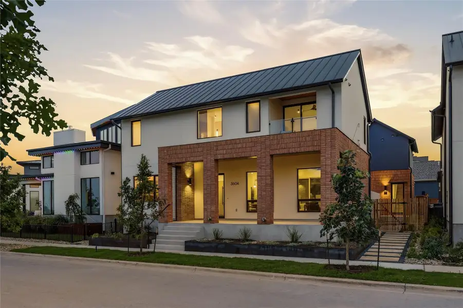 Front exterior of a new home in , Austin, TX, highlighting curb appeal (Image 1). Front exterior of a new home in , Austin, TX, highlighting curb appeal (Image 1).