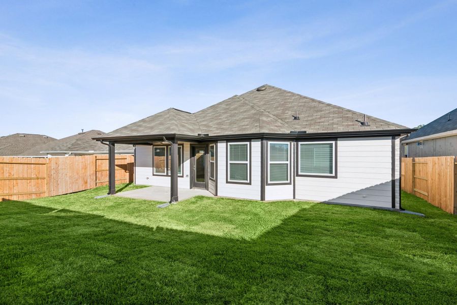 Exterior details and patio area of a home in Magnolia Ridge, Magnolia (Image 4).
