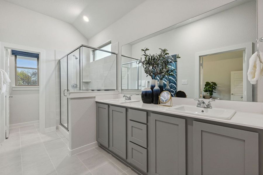 Primary Bathroom in the Claret home plan by Trophy Signature Homes