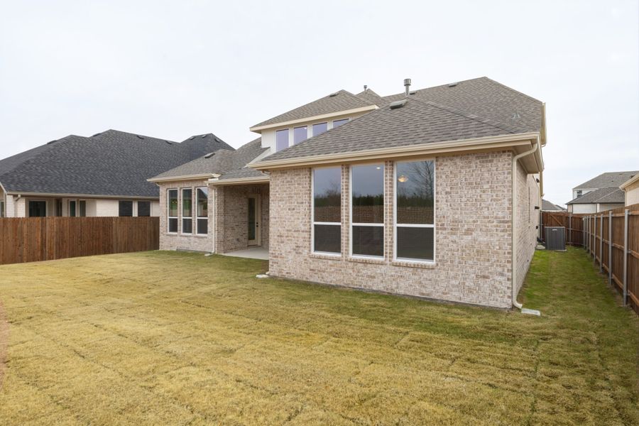 Exterior details and patio area of a home in Edgewater, Fate (Image 23).