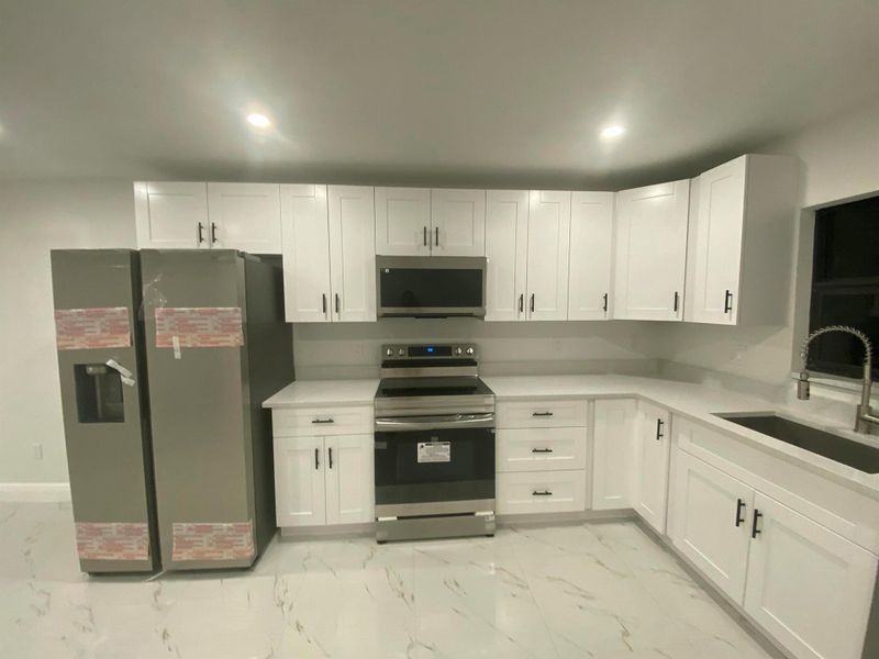 Furnished interior view inside a new home in , Indiantown (Image 5).