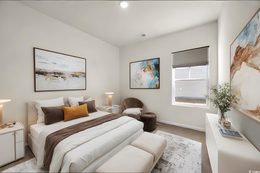 Bedroom featuring light colored carpet, baseboards, and visible vents