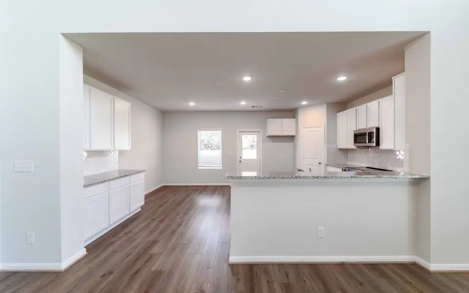 Furnished interior view inside a new home in Grande Estates, Bertram (Image 4).