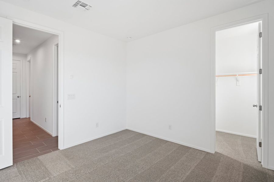 Spacious, unfurnished interior of a new home in Marbella at Windrose, Waddell (Image 39).