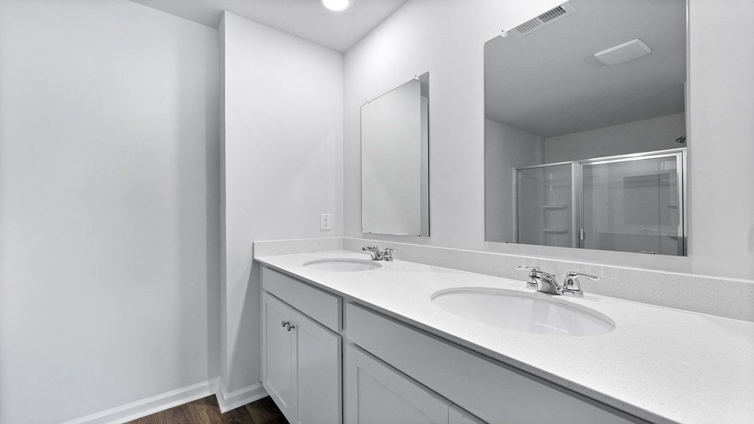Furnished interior view inside a new home in Pine Hills at Cane Bay, Summerville (Image 3). Furnished interior view inside a new home in Pine Hills at Cane Bay, Summerville (Image 3).