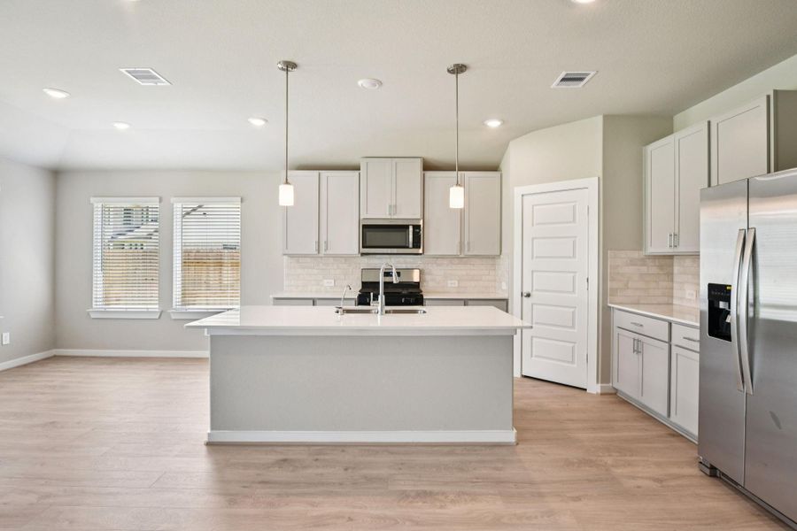 Photo is not of the actual home, but is an inspirational photo of builder’s model home and may depict options, furnishings, and/or decorator features that are not included