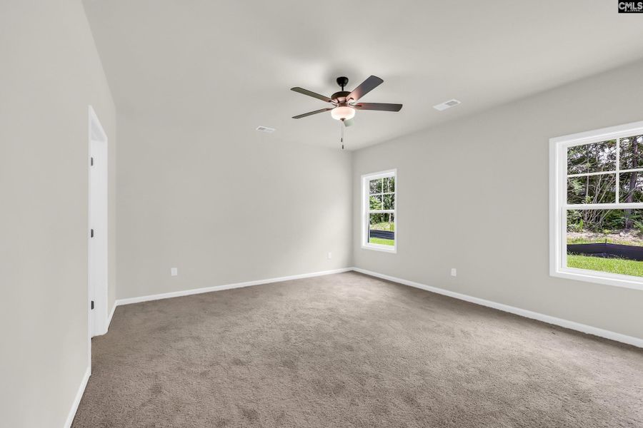 Spacious, unfurnished interior of a new home in Cottages at Roofs Pond, West Columbia (Image 10).