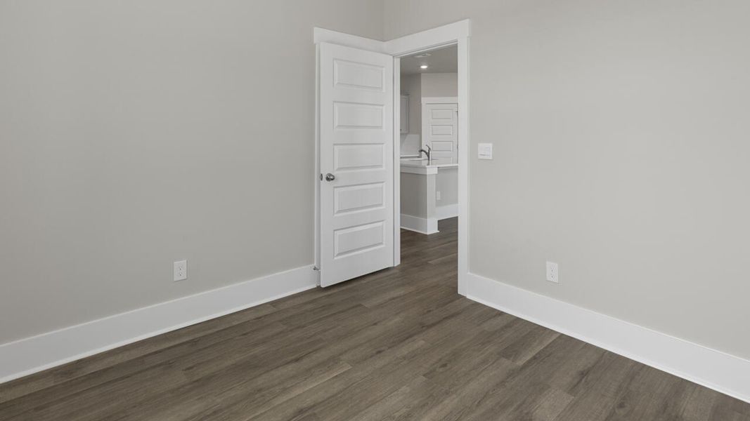 Spacious, unfurnished interior of a new home in The Cove at Indigo Preserve, Leland (Image 20).