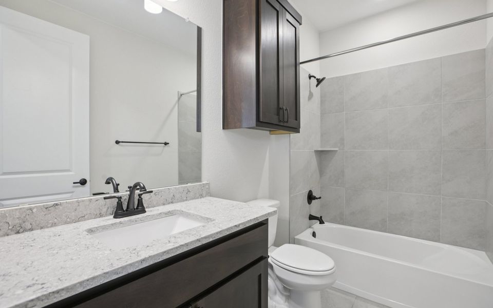 Furnished interior view inside a new home in Kissing Tree, San Marcos (Image 4).