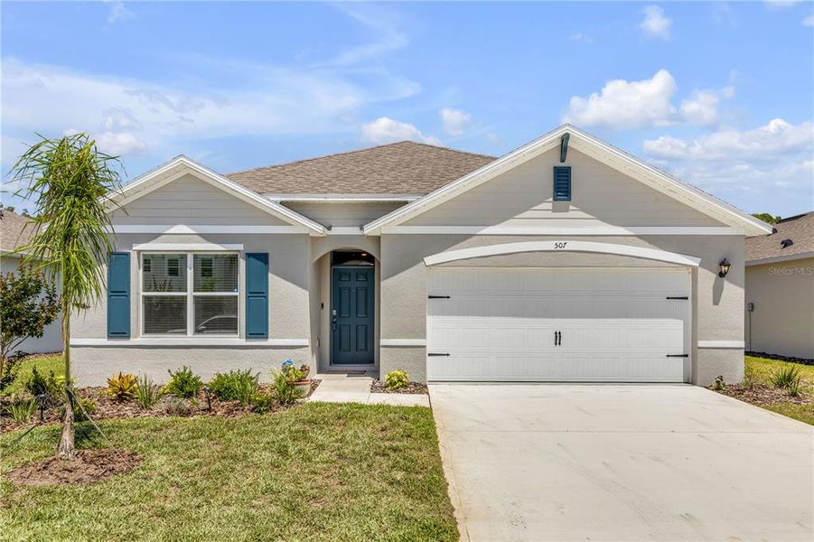 Front exterior of a new home in , New Smyrna Beach, FL, highlighting curb appeal (Image 29).