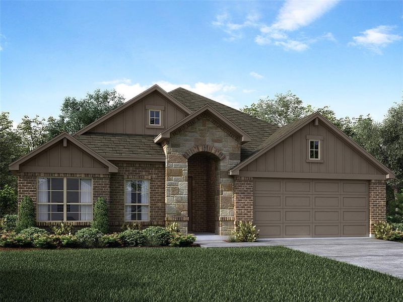 View of front facade featuring a garage and a front yard