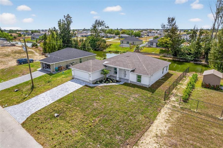 Front exterior of a new home in , Cape Coral, FL, highlighting curb appeal (Image 24).
