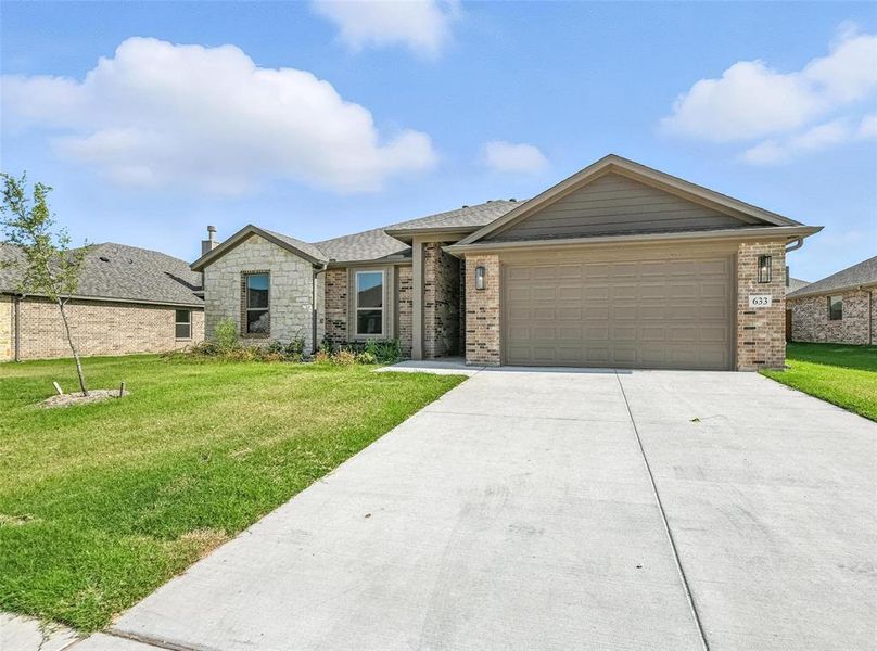 Front exterior of a new home in Willow Vista Estates, Saginaw, TX, highlighting curb appeal (Image 24). Front exterior of a new home in Willow Vista Estates, Saginaw, TX, highlighting curb appeal (Image 24).
