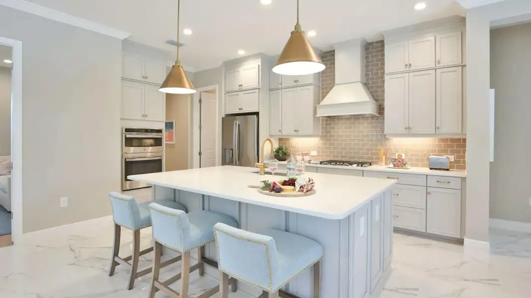 Furnished interior view inside a new home in Palm Grove Real Estate and Homes for Sale in Lakewood Ranch, FL - Neal Communities, Bradenton (Image 9).
