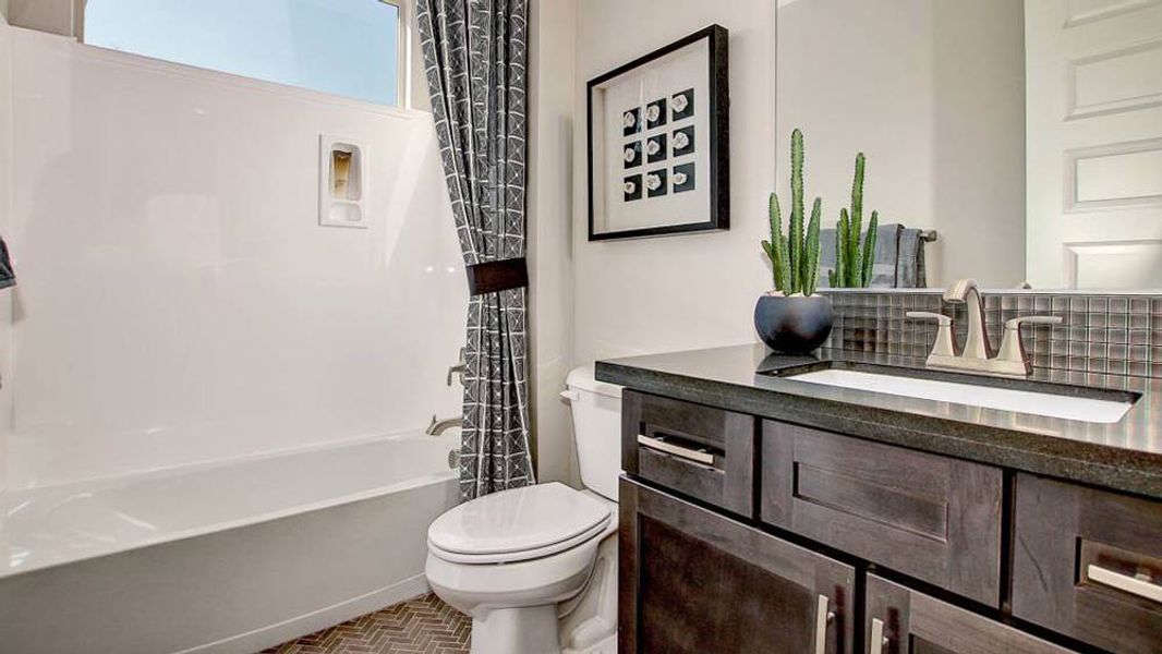 Representative furnished interior of a home built from the Shire by Taylor Morrison in Victory at Verrado Venture II Collection 55+, Buckeye (Image 18).