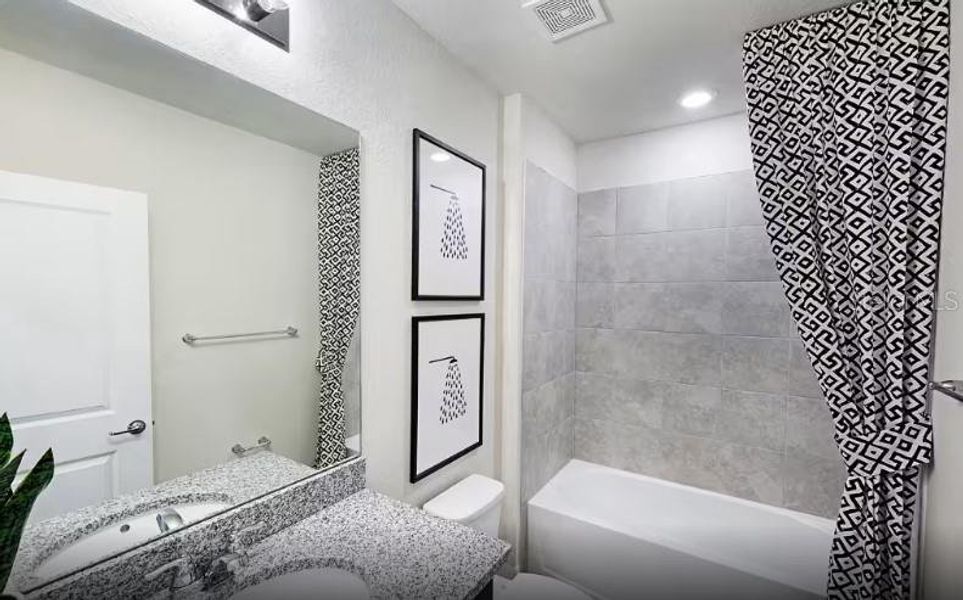 Furnished interior view inside a new home in Lakespur Wellen Park, Venice (Image 12).