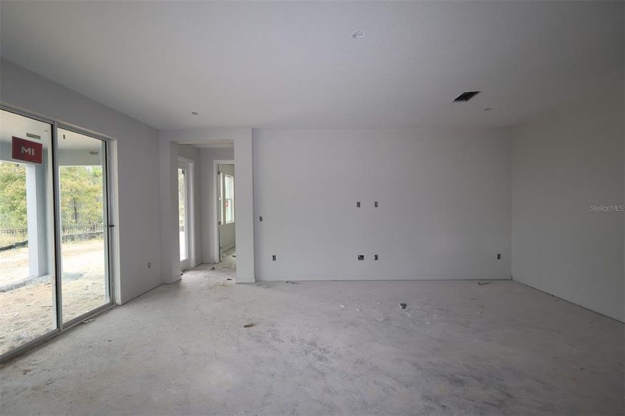 In-progress construction of a new home in Lake Star at Ovation, Winter Garden, FL (Image 19).