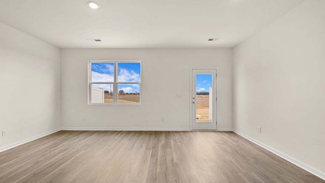 Spacious, unfurnished interior of a new home in Young's Crossing, Stone Mountain (Image 13).