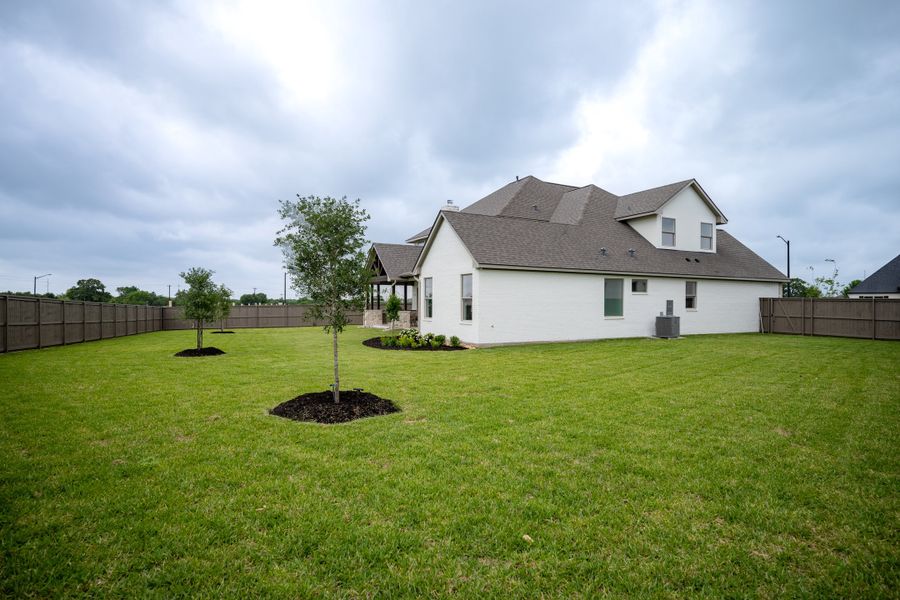 Exterior details and patio area of a home in Stella Ranch, Bryan (Image 36).