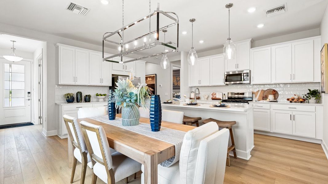 Representative furnished interior of a home built from the Alta by Taylor Morrison in Esplanade at Wellen Park, Englewood (Image 5).