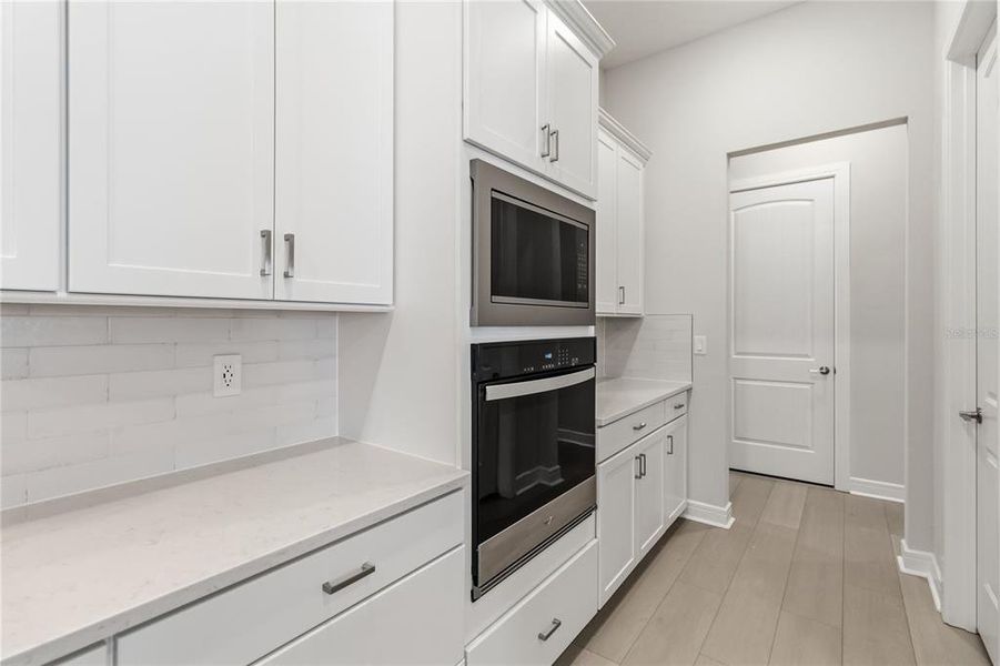 Furnished interior view inside a new home in Del Webb Sunbridge, St. Cloud (Image 11).
