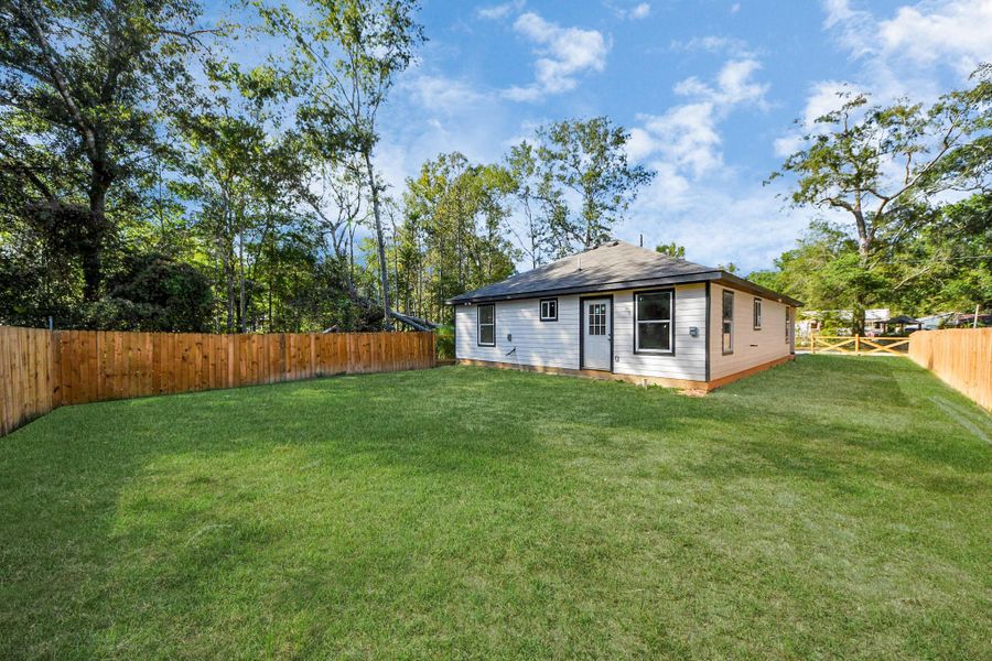 Exterior details and patio area of a home in , Splendora (Image 2).