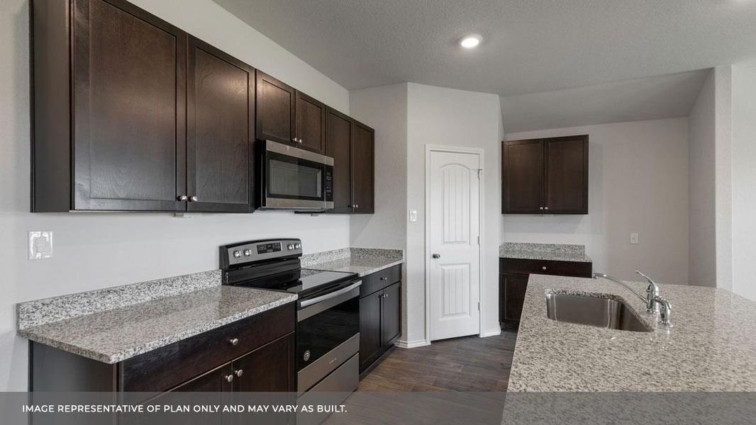 Furnished interior view inside a new home in Bar W Ranch, Leander (Image 8). Furnished interior view inside a new home in Bar W Ranch, Leander (Image 8).