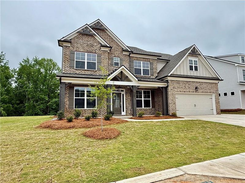 Front exterior of a new home in Ponderosa Farms Reserve, Gainesville, GA, highlighting curb appeal (Image 28).
