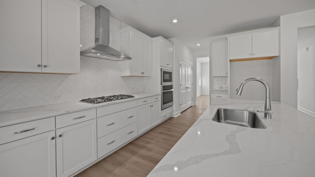 The Burton Plan in Farms at Bellingham by DRB Homes in Charlotte NC - Kitchen