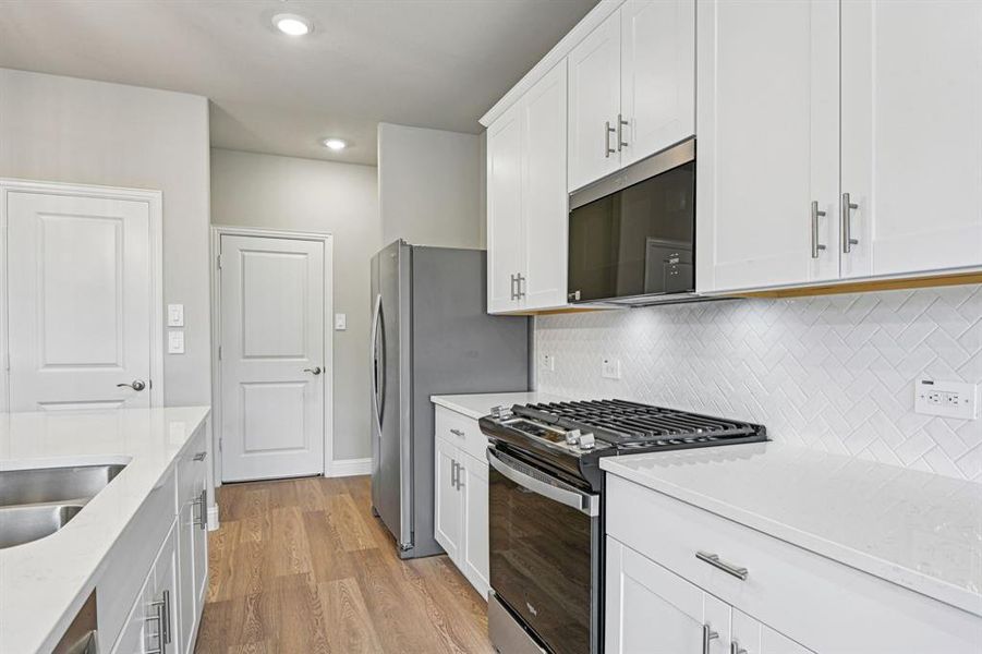 Furnished interior view inside a new home in Parks at Foster Crossing - Signature Series, Anna (Image 16).