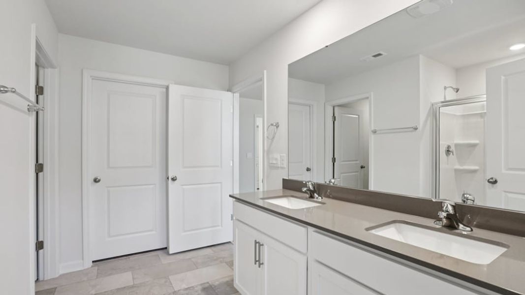 Furnished interior view inside a new home in The Landing at Winston Pointe, Clayton (Image 11). Furnished interior view inside a new home in The Landing at Winston Pointe, Clayton (Image 11).