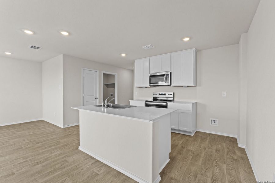 Furnished interior view inside a new home in Swenson Heights, Seguin (Image 7).