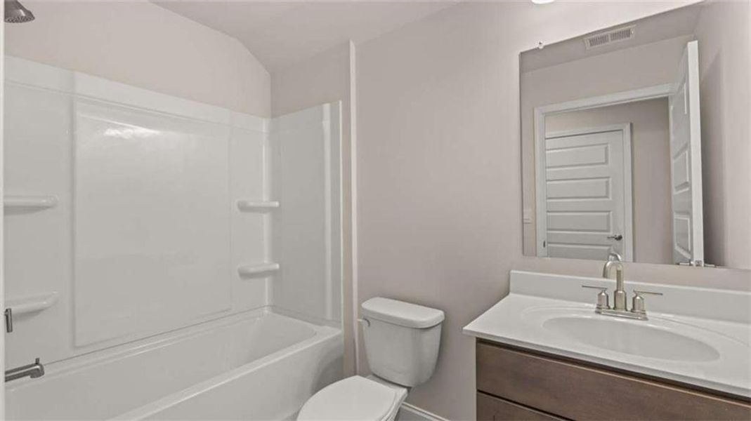 Furnished interior view inside a new home in Oak Ridge Meadows - Active Adult, Locust Grove (Image 12).