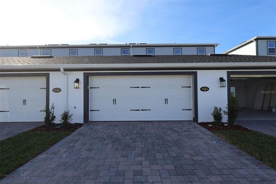 Exterior details and patio area of a home in Tribute at Ovation, Winter Garden (Image 29). Exterior details and patio area of a home in Tribute at Ovation, Winter Garden (Image 29).