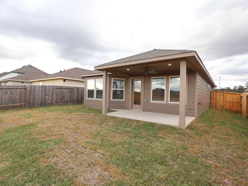Exterior details and patio area of a home in Magnolia Ridge, Magnolia (Image 4).