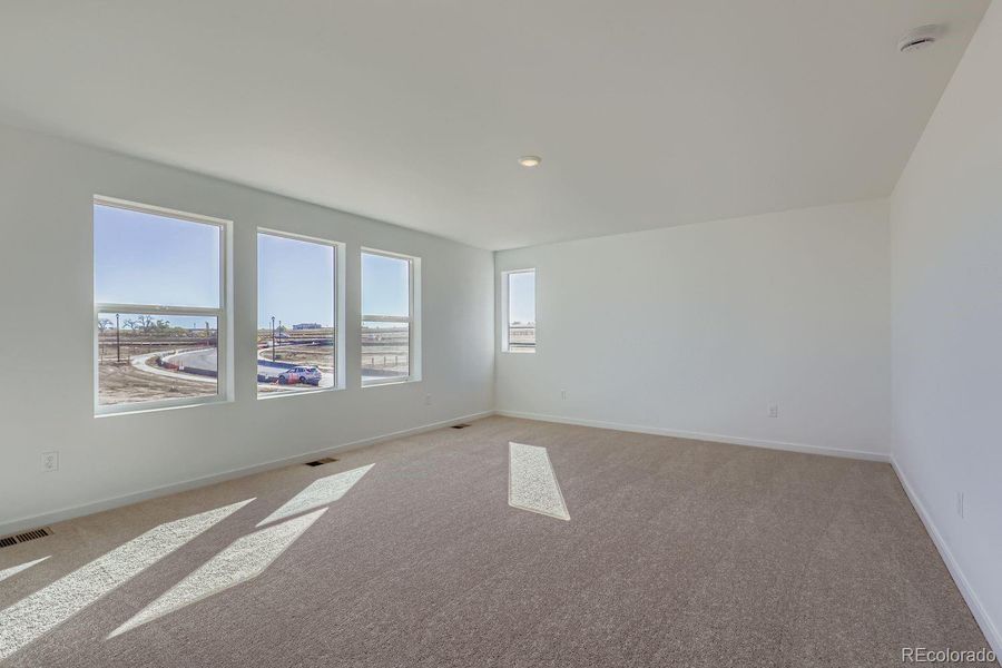 Spacious, unfurnished interior of a new home in Eastcreek Farm: The Camden Collection, Thornton (Image 8).