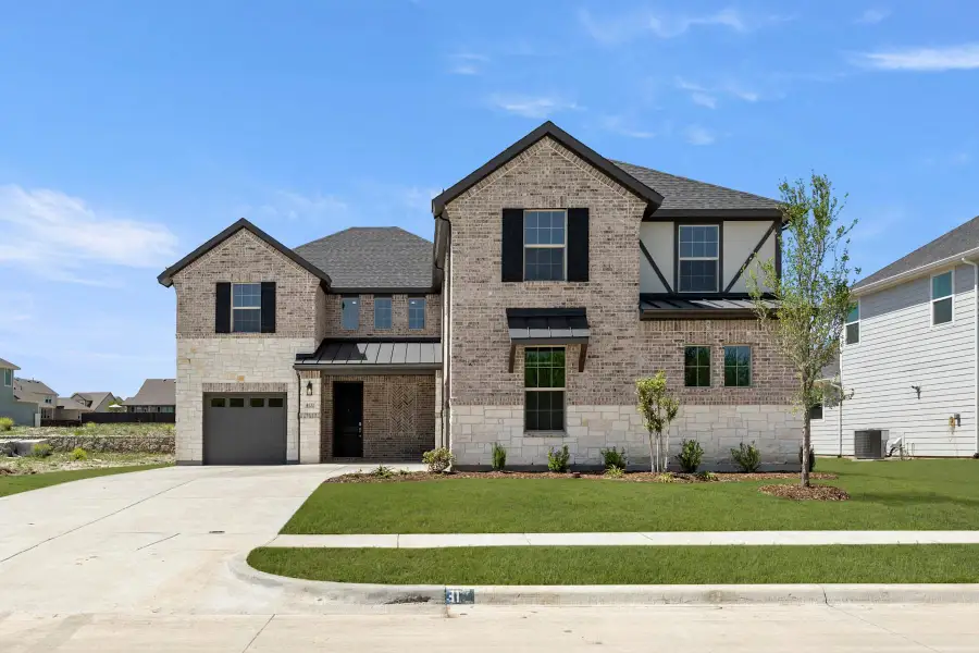 Representative exterior photo of a completed home built from the Owen by Tri Pointe Homes in LaPrelle, Haslet, TX (Image 1). Representative exterior photo of a completed home built from the Owen by Tri Pointe Homes in LaPrelle, Haslet, TX (Image 1).