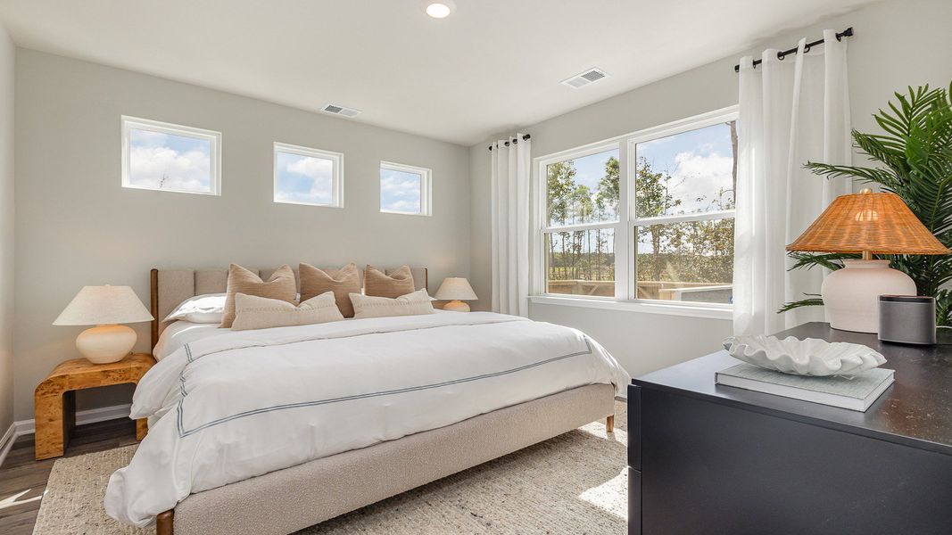 Furnished interior view inside a new home in Rich Square at Brunswick Plantation, Ash (Image 13).