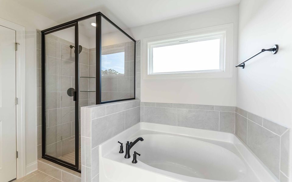 Furnished interior view inside a new home in Aden Woods, Fairview (Image 9).