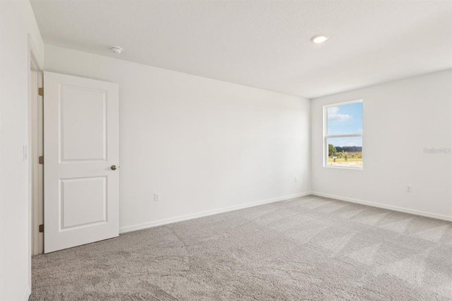 Spacious, unfurnished interior of a new home in Trailside, Mount Dora (Image 24).
