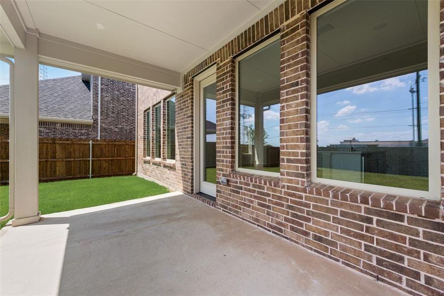 Exterior details and patio area of a home in Walden Pond, Forney (Image 4).