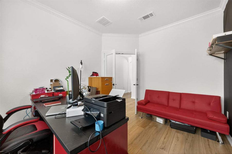 Furnished interior view inside a new home in Sunterra, Katy (Image 17).